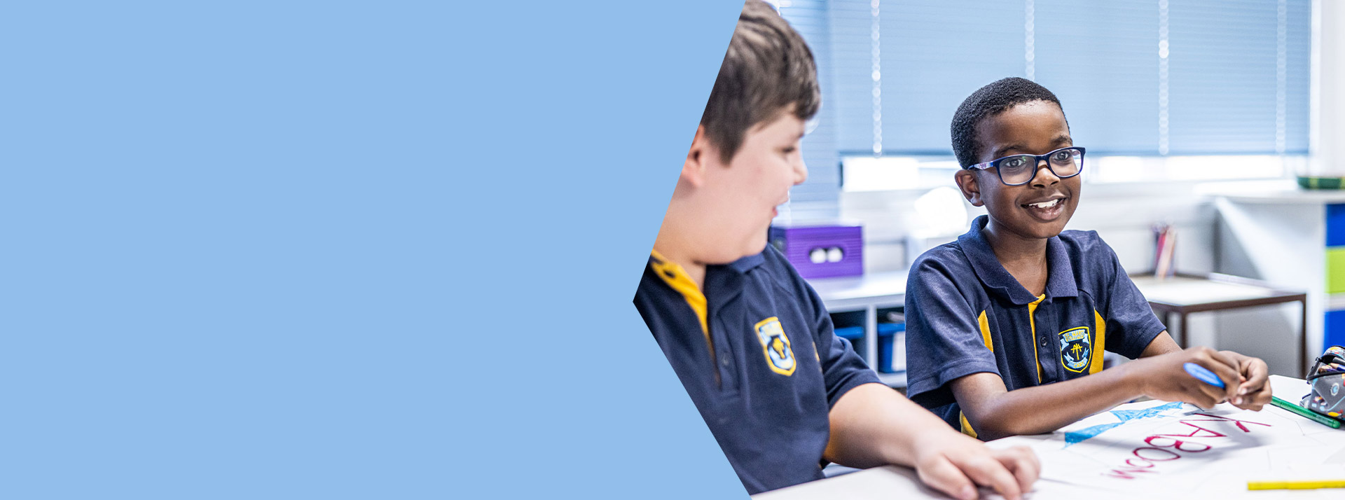 Student smiling in the classroom at St Mary's Primary School Rydalmere