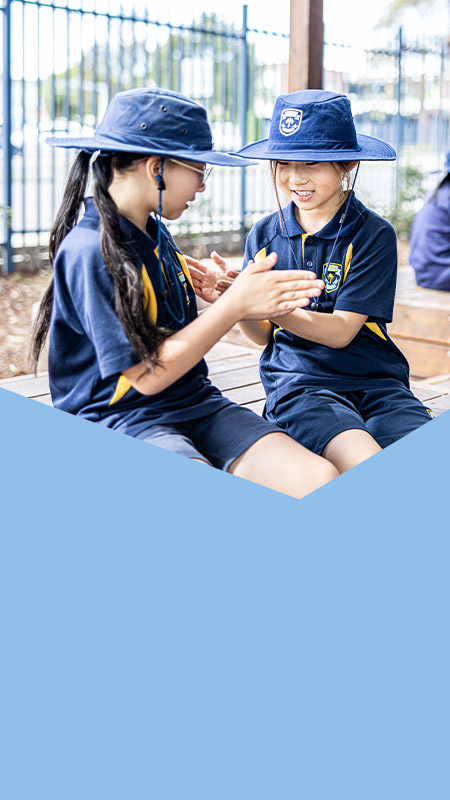 Students playing together in the playground at St Mary's Primary School Rydalmere