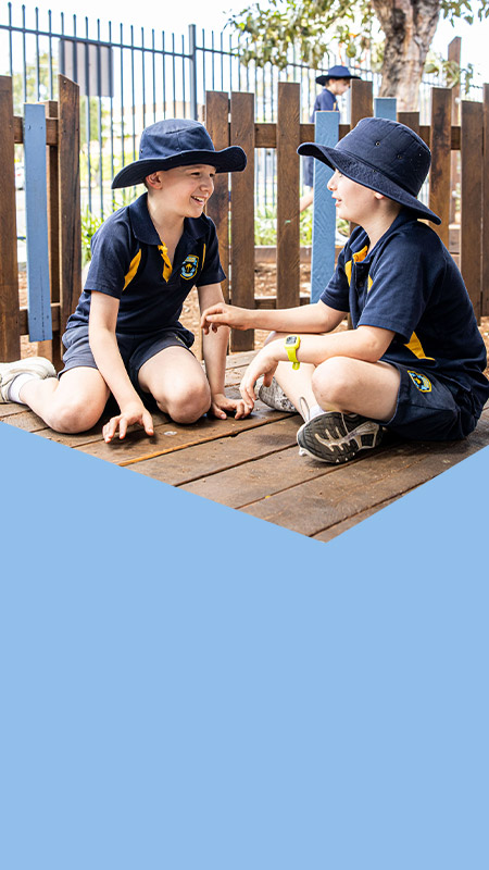 Students playing together outside at St Mary's Primary School Rydalmere