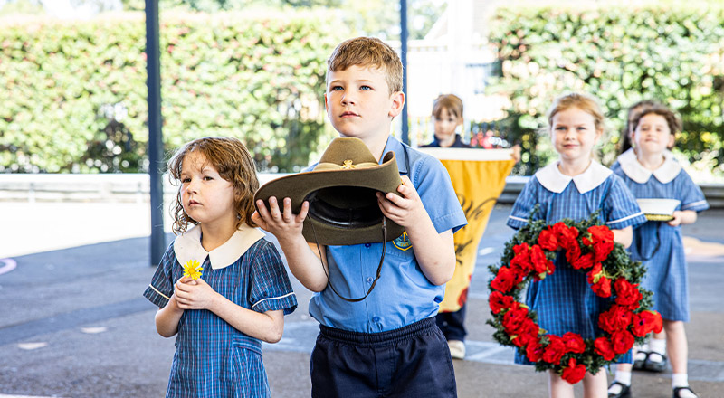 Students participating in an ANZAC day liturgy at St Mary's Primary School Rydalmere