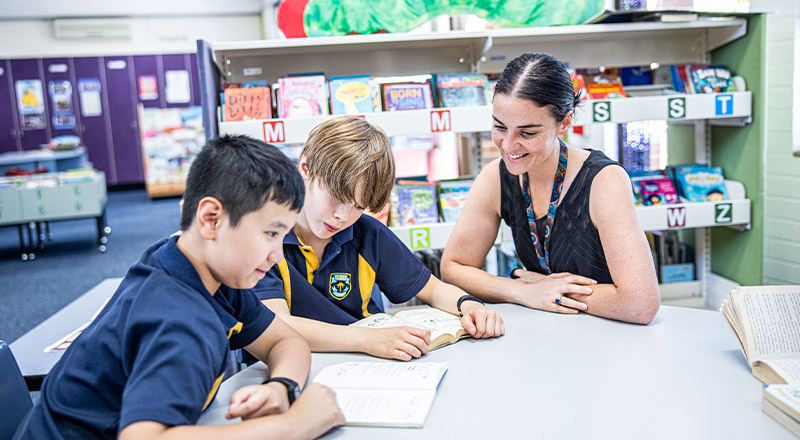 Students with their teacher in a Religion lesson in the classroom at St Mary's Primary School Rydalmere