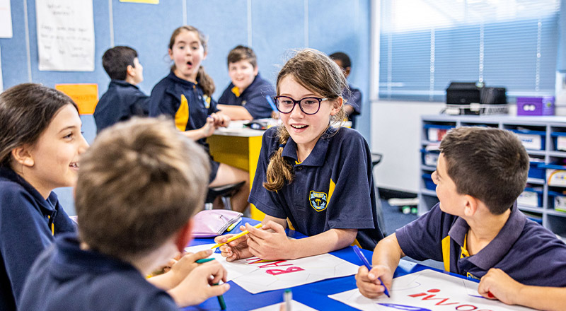 Students working together in the classroom at St Mary's Primary School Rydalmere