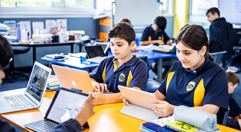 Students using their laptops in the classroom at St Mary's Primary School Rydalmere