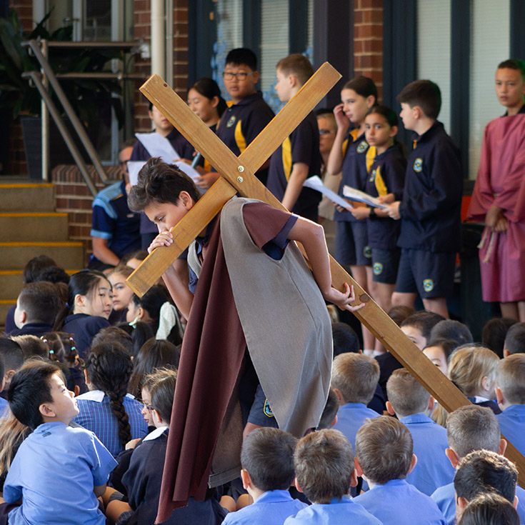Student performing in a school liturgy at St Mary's Primary School Rydalmere
