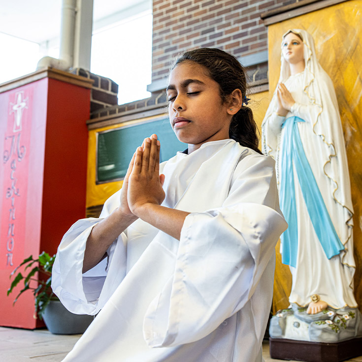 Student performing in a liturgy at St Mary's Primary School Rydalmere