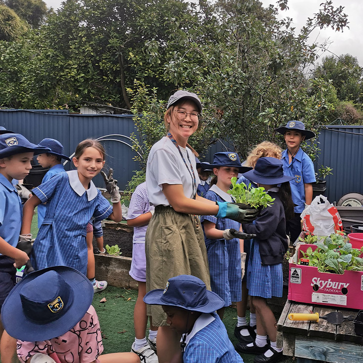 Students gardening together at St Mary's Primary School Rydalmere